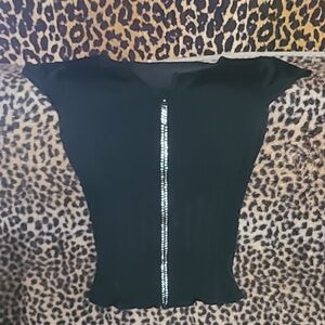 Black top with Rhinestones on the zipper.